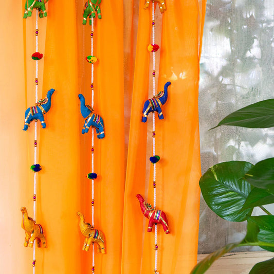 String of Elephants with Bell