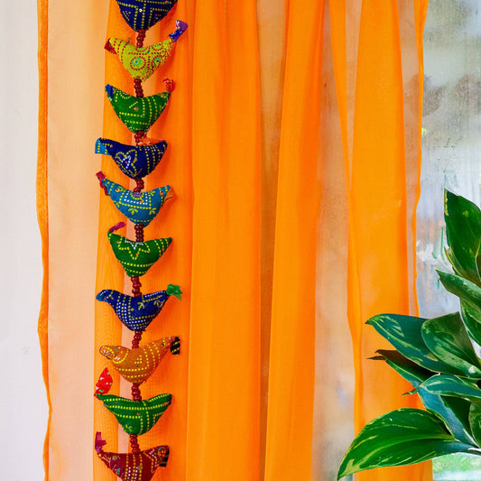 String of Birds with Bell